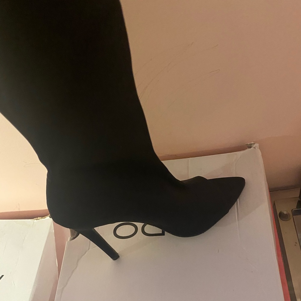 Thigh high peep toe boot